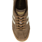 Top-down view of a brown Gola Harrier suede trainer with white stripes.