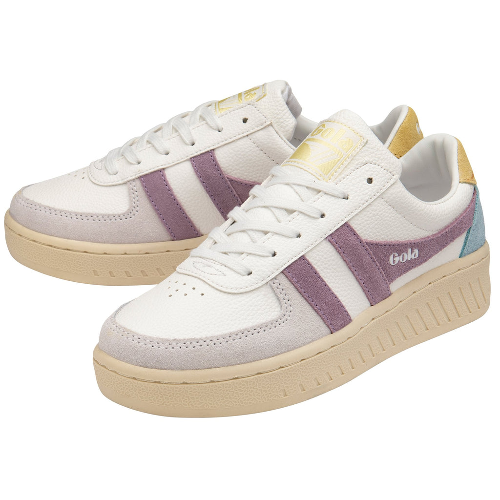 Two white Gola sneakers with purple stripes, blue and yellow accents.