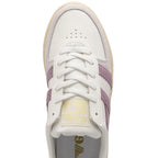 An overhead view of a white Gola sneaker with purple stripes.