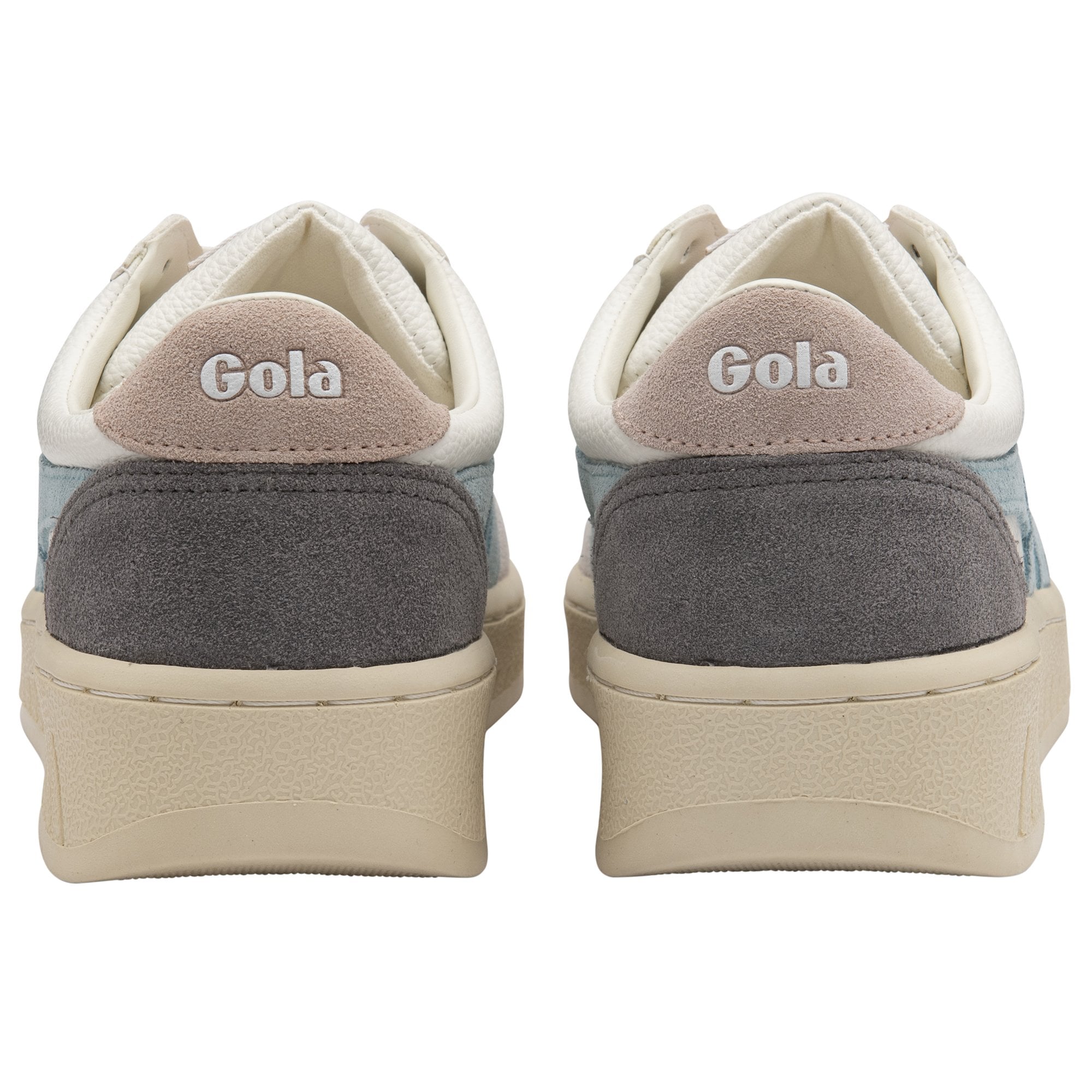 The back view of a pair of Gola sneakers, showing the logo on the heel.