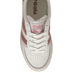A top-down view of a white and pink Gola sneaker with white laces.