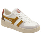 A white Gola sneaker with mustard stripes and brown accents on a white background.