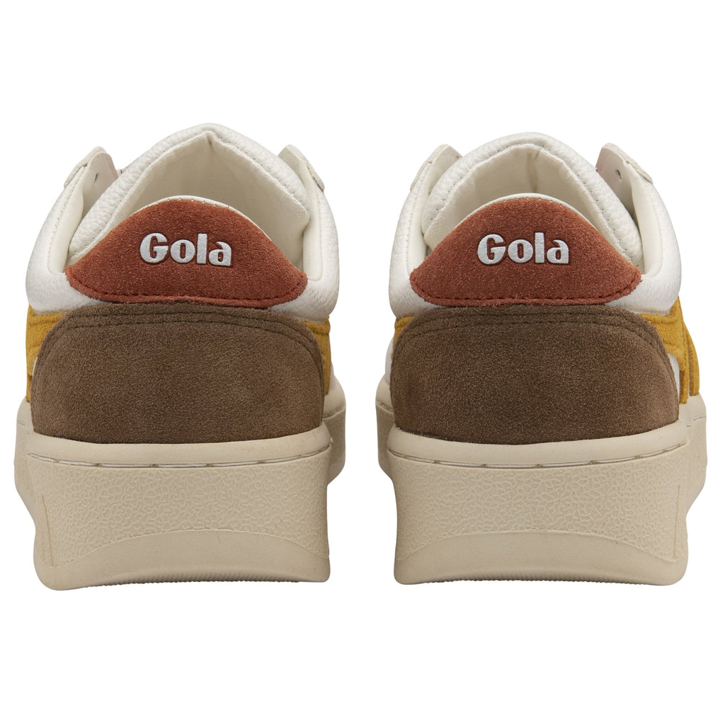 The back view of two Gola sneakers, showing the Gola logo on the heel.