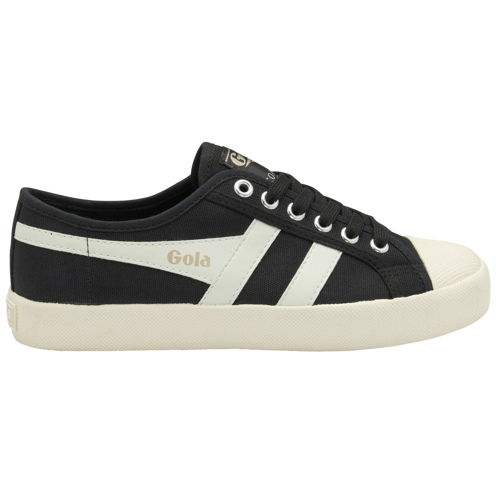 Black and white Gola Coaster sneakers with white laces, viewed from the side.
