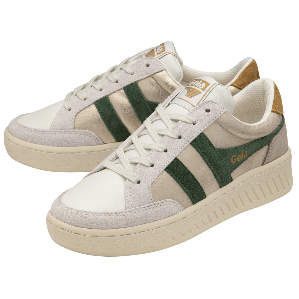 A pair of Gola low-top sneakers in off-white and green, with tan heel accents, viewed from an angle.