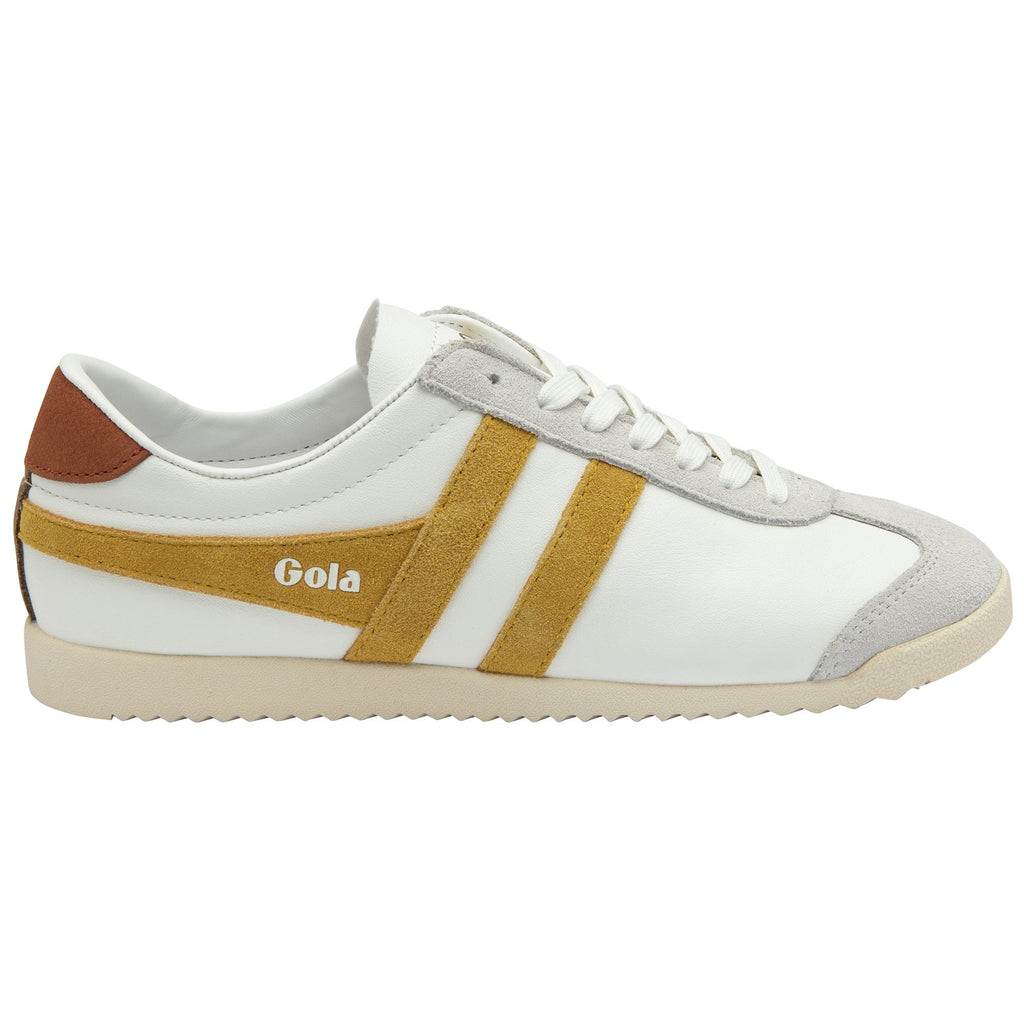 A white Gola Bullet sneaker with gold stripes and a brown heel accent.