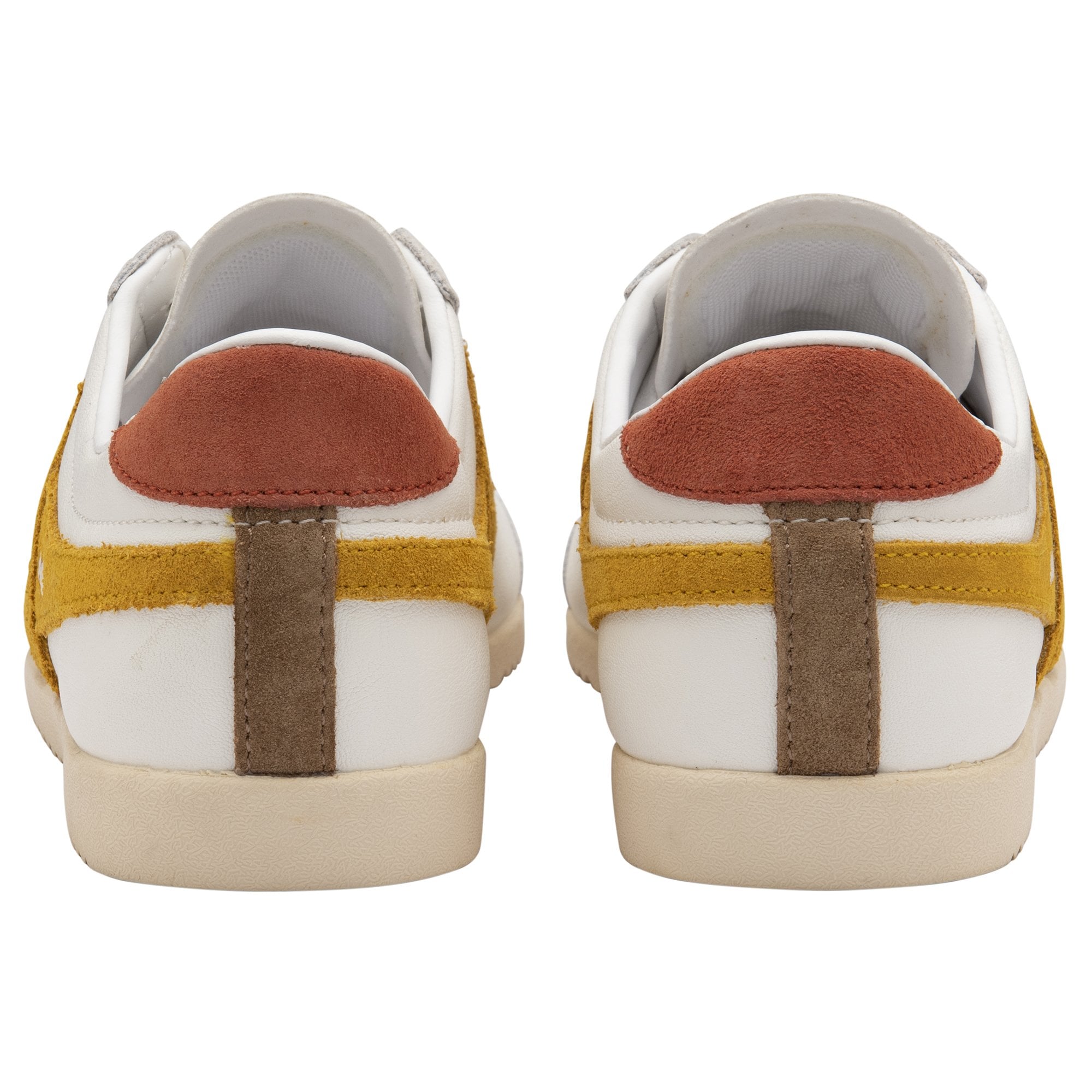 The back view of a pair of white Gola Bullet sneakers with brown heel accents.