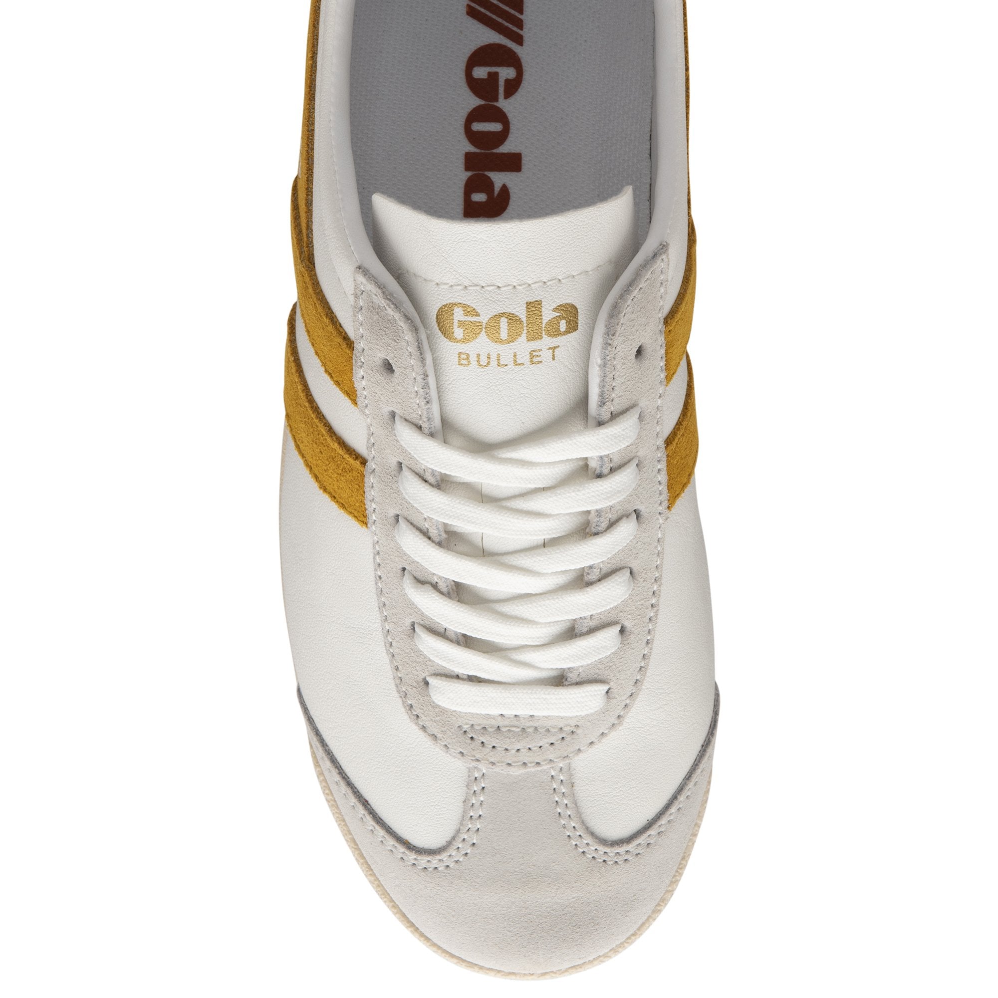 Top-down view of a white Gola Bullet sneaker with gold stripes and white laces.