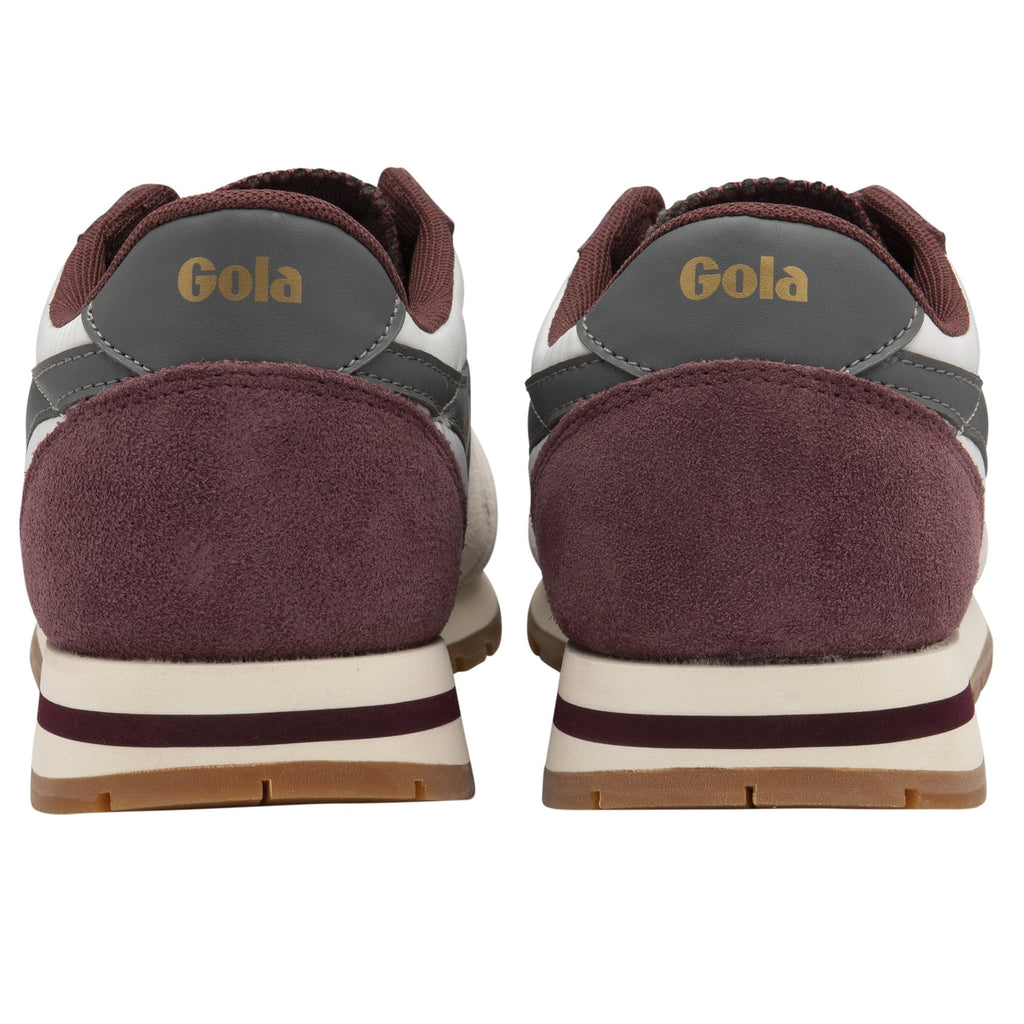 A back view of a pair of Gola white, grey and burgundy trainers.