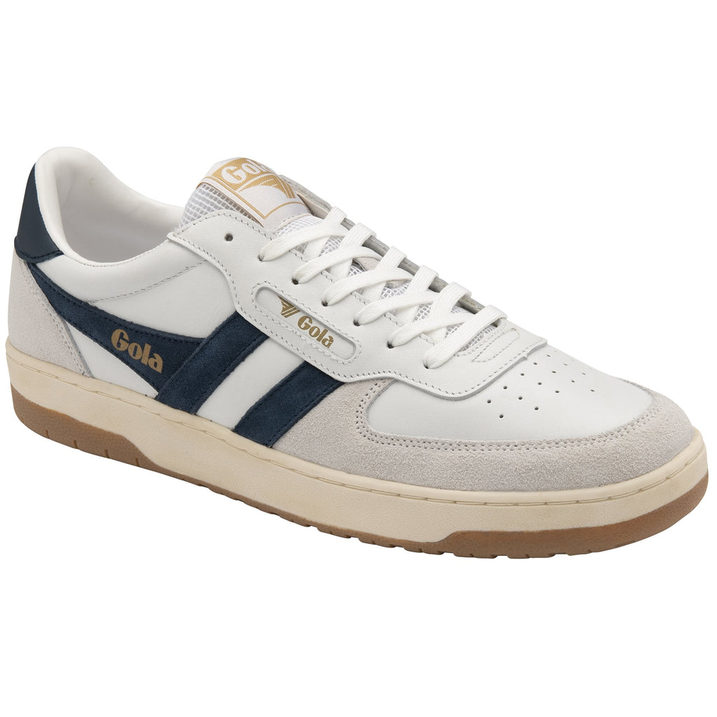 Angled view of a white Gola sneaker with navy stripes and a gum sole. 