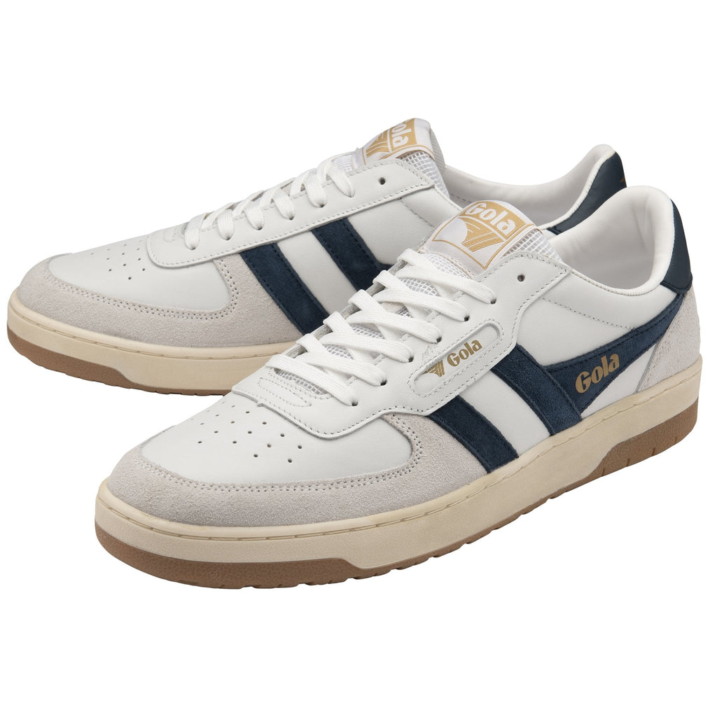 Pair of white Gola sneakers with navy stripes and gum soles. 
