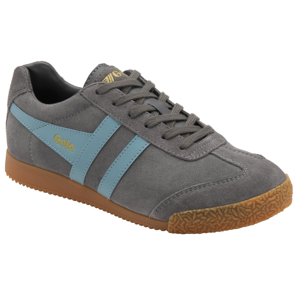 A gray Gola sneaker with light blue stripes and a gum sole, angled left.