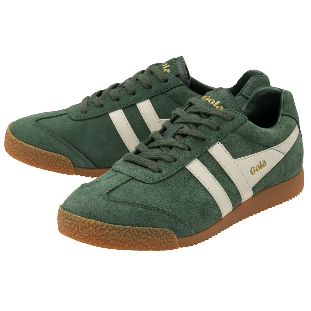 A pair of forest green Gola Harrier sneakers with white stripes and gum soles, viewed from an angle.