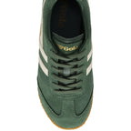 A top-down view of a forest green Gola Harrier sneaker with white stripes and a gum sole.