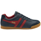 A single Gola low-top sneaker in navy with red stripes and a gum sole, viewed from the side.