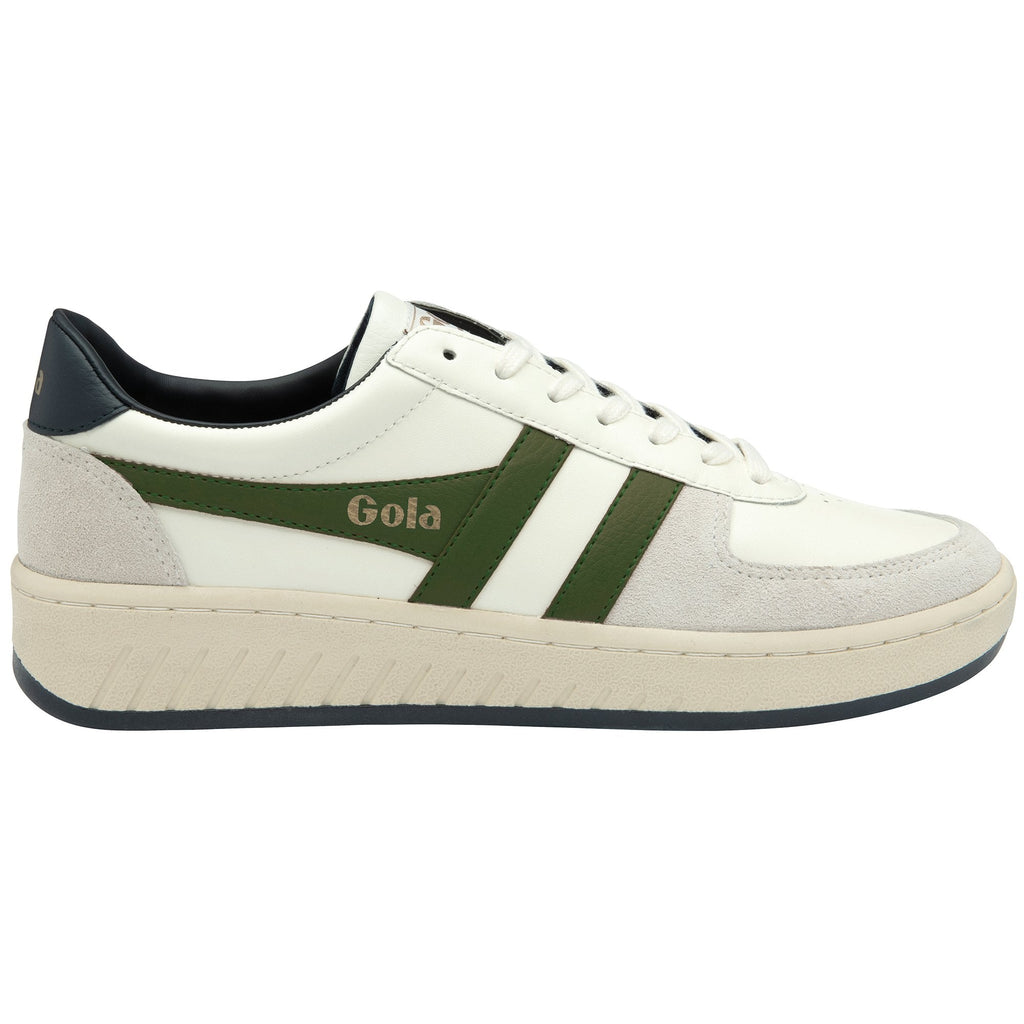 A white and green Gola sneaker with a beige sole, viewed from the side.