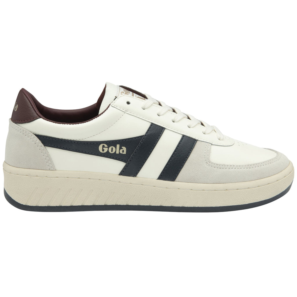 A single Gola men's sneaker in white and navy with a brown heel. 