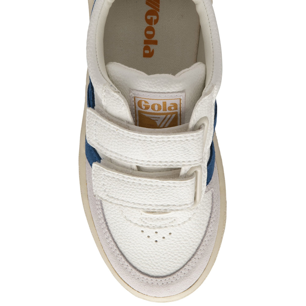 The top-down view of a white Gola sneaker with blue stripes and white velcro straps.