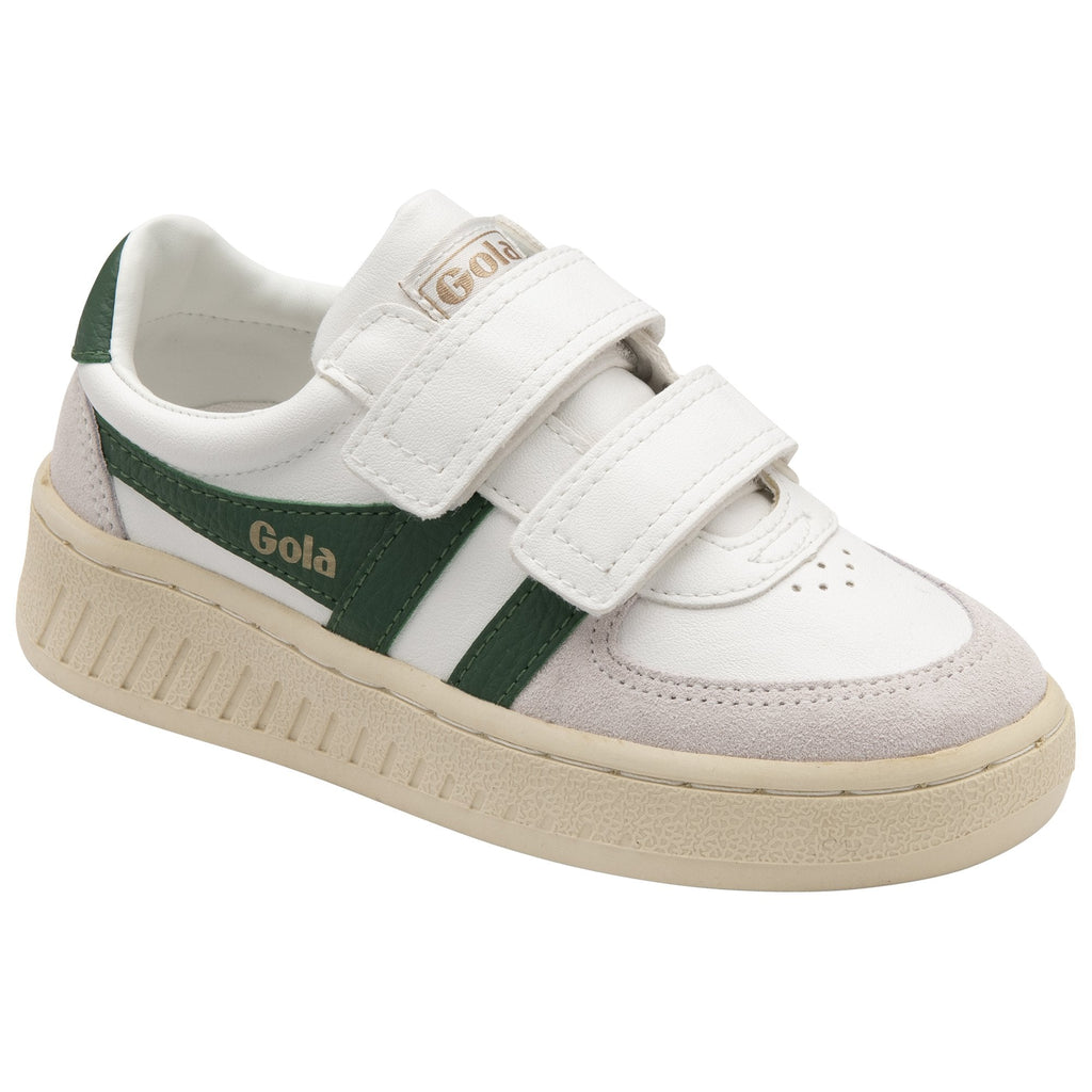 A child's white Gola sneakers with two green stripes and Velcro straps.