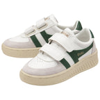 A pair of children's white Gola sneakers with green stripes and Velcro straps.