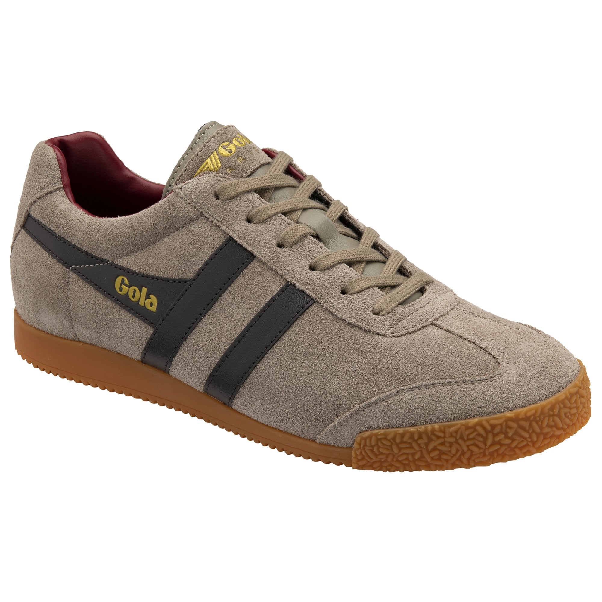 A front view of the right light brown Gola shoe with dark stripes on its side.