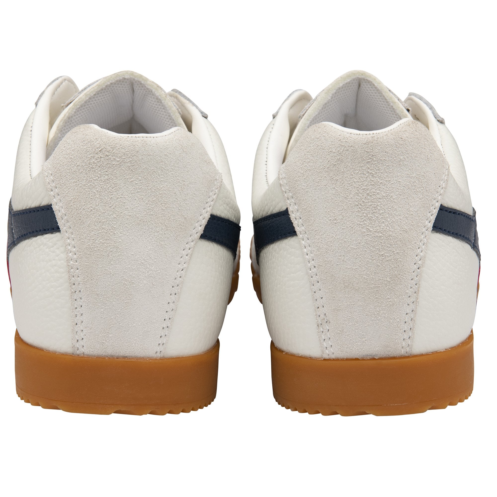 The back view of a pair of white, red, and blue athletic shoes with brown soles.