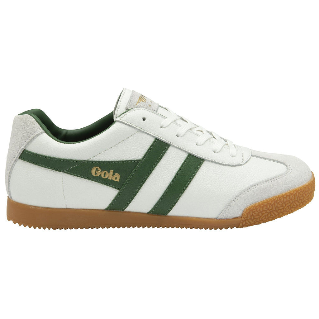 A single white Gola Harrier trainer with green stripes and a gum sole, viewed from the side.
