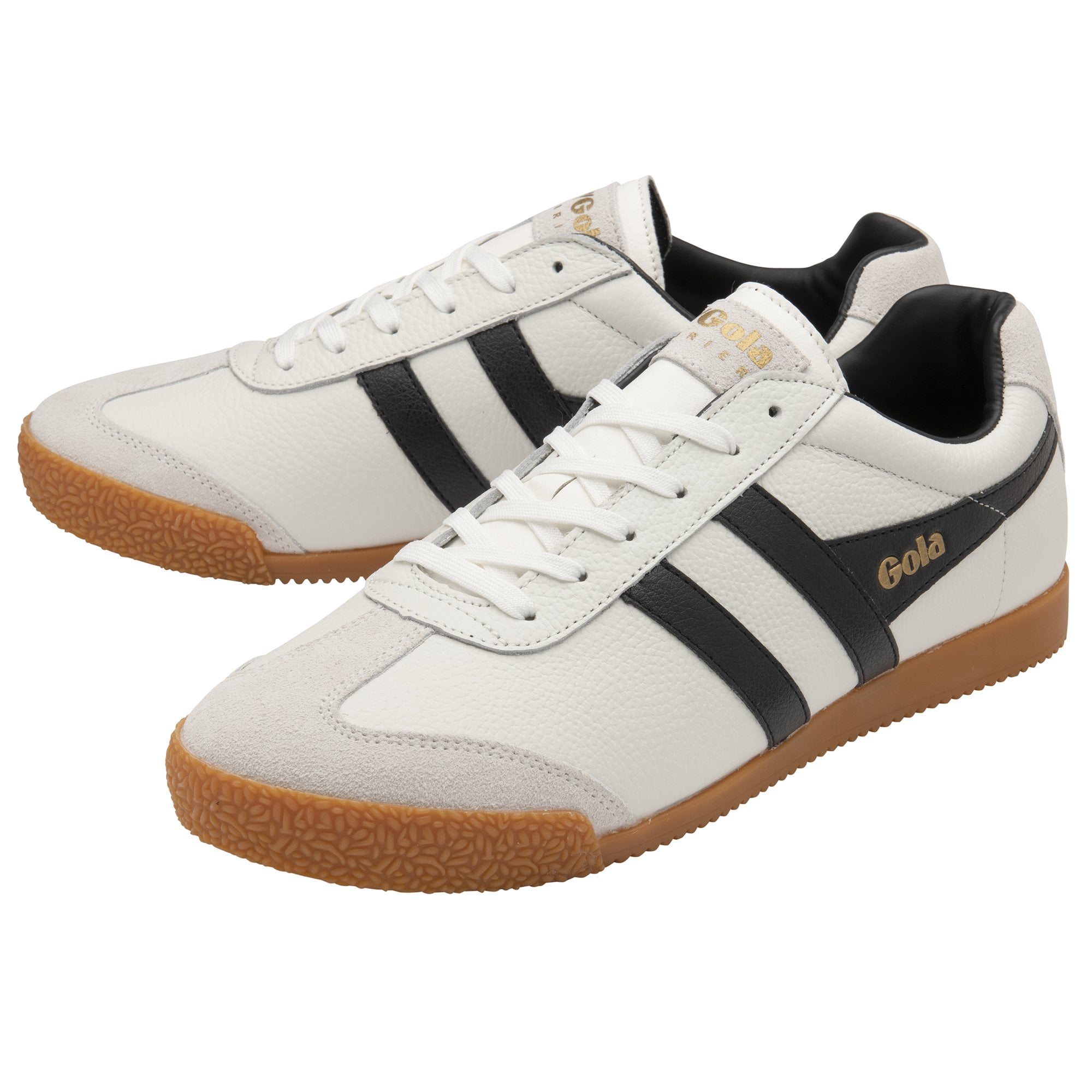 Pair of Gola Harrier trainers, white leather with black stripes and gum soles.