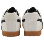 Rear view of two Gola Harrier trainers, white with black accents and gum soles.