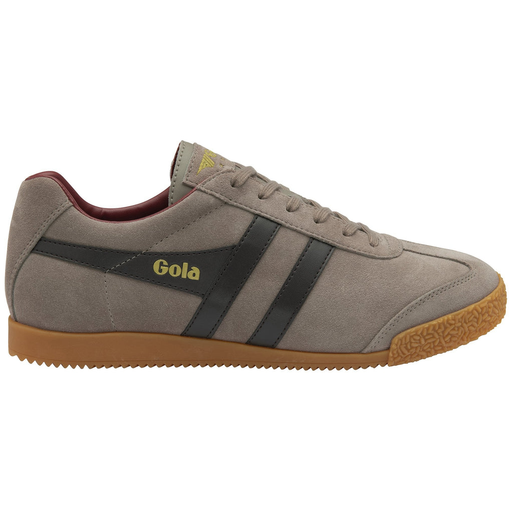 A right light brown Gola shoe with dark stripes on its side.