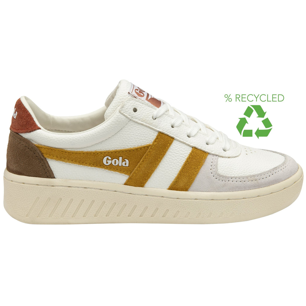 A white Gola sneaker with mustard stripes and brown accents, promoting recycled materials.