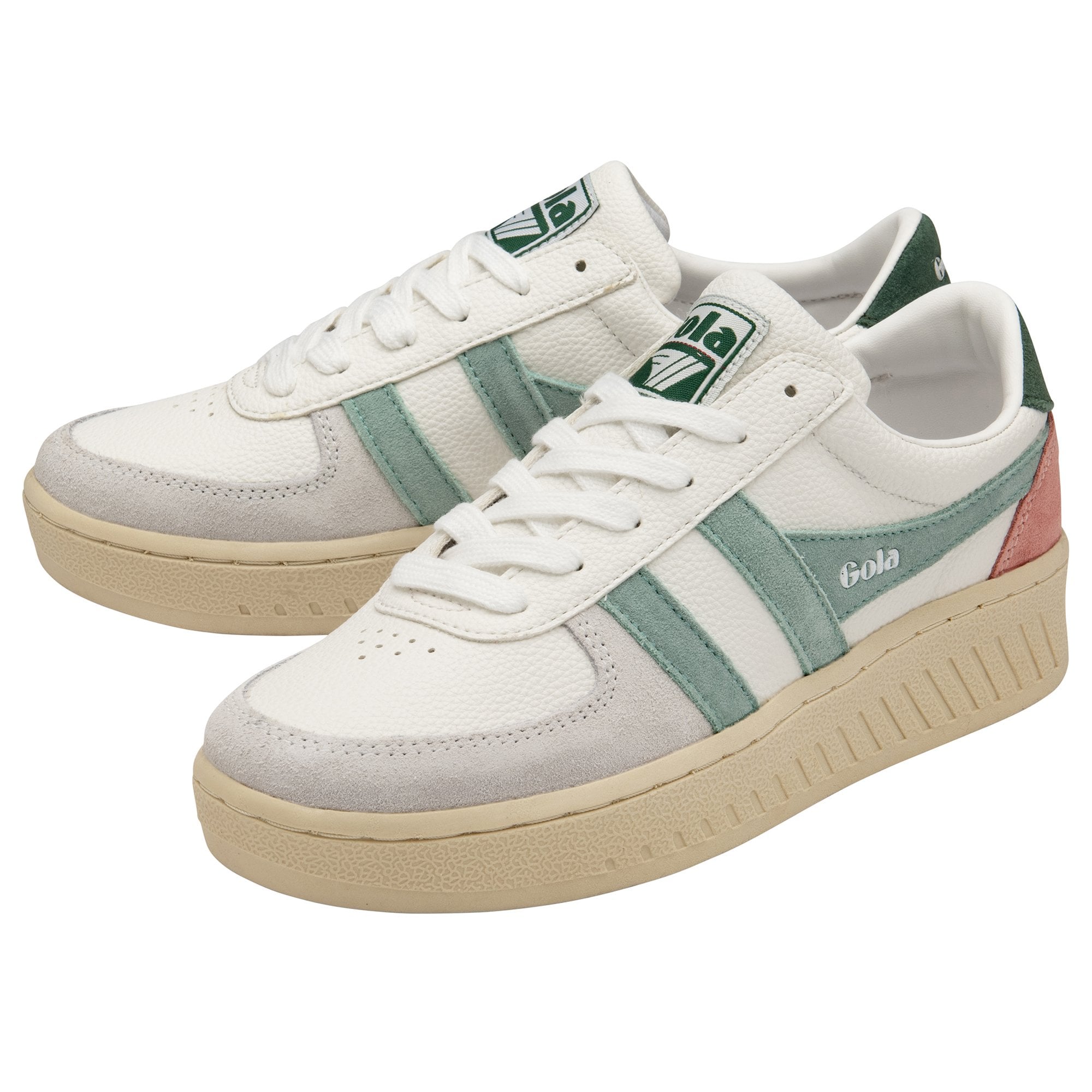 Two Gola sneakers in white with green and pink accents, seen from a side view.
