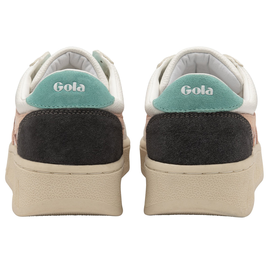 The back view of a pair of white Gola sneakers, highlighting the teal and black heel details.