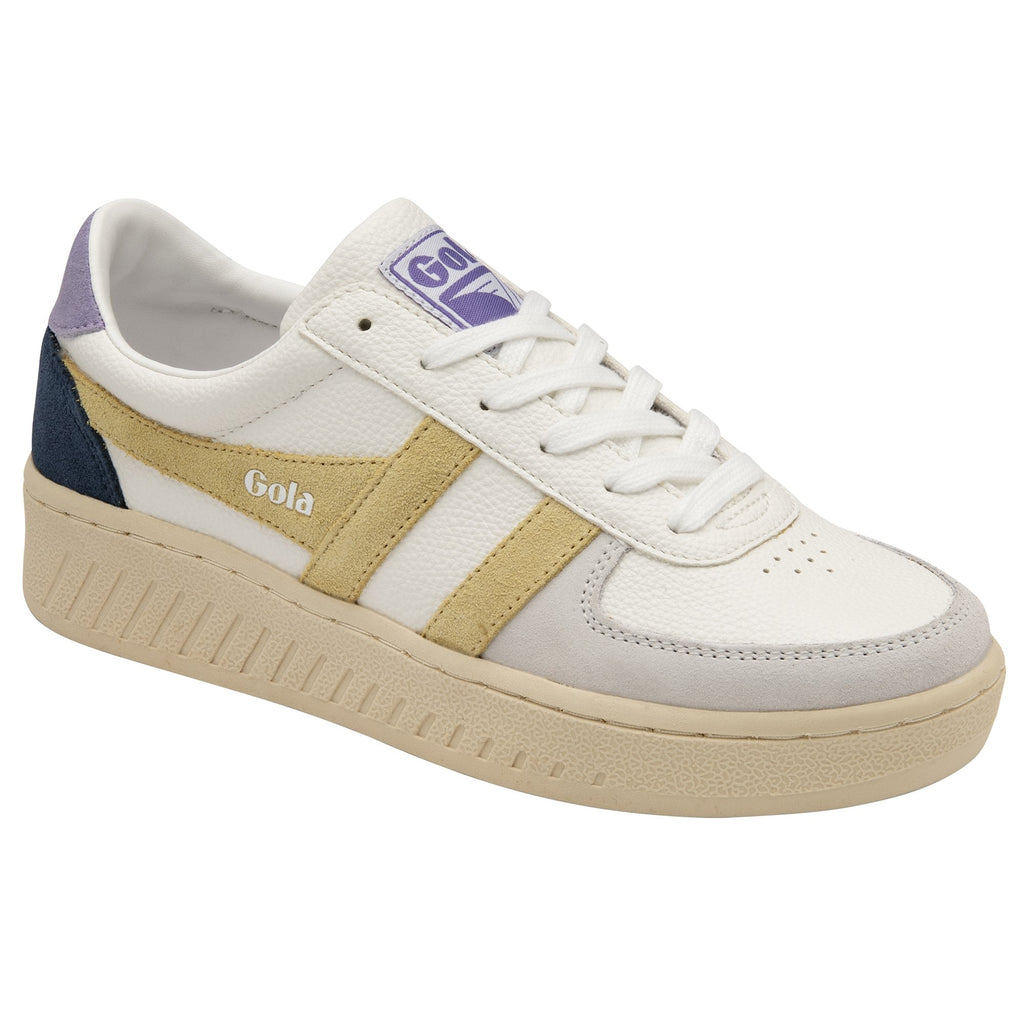 A single Gola sneaker with a white base, gold stripes, blue heel, and beige sole.