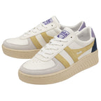 A pair of Gola sneakers with a white base, gold stripes, blue heel, and beige sole.
