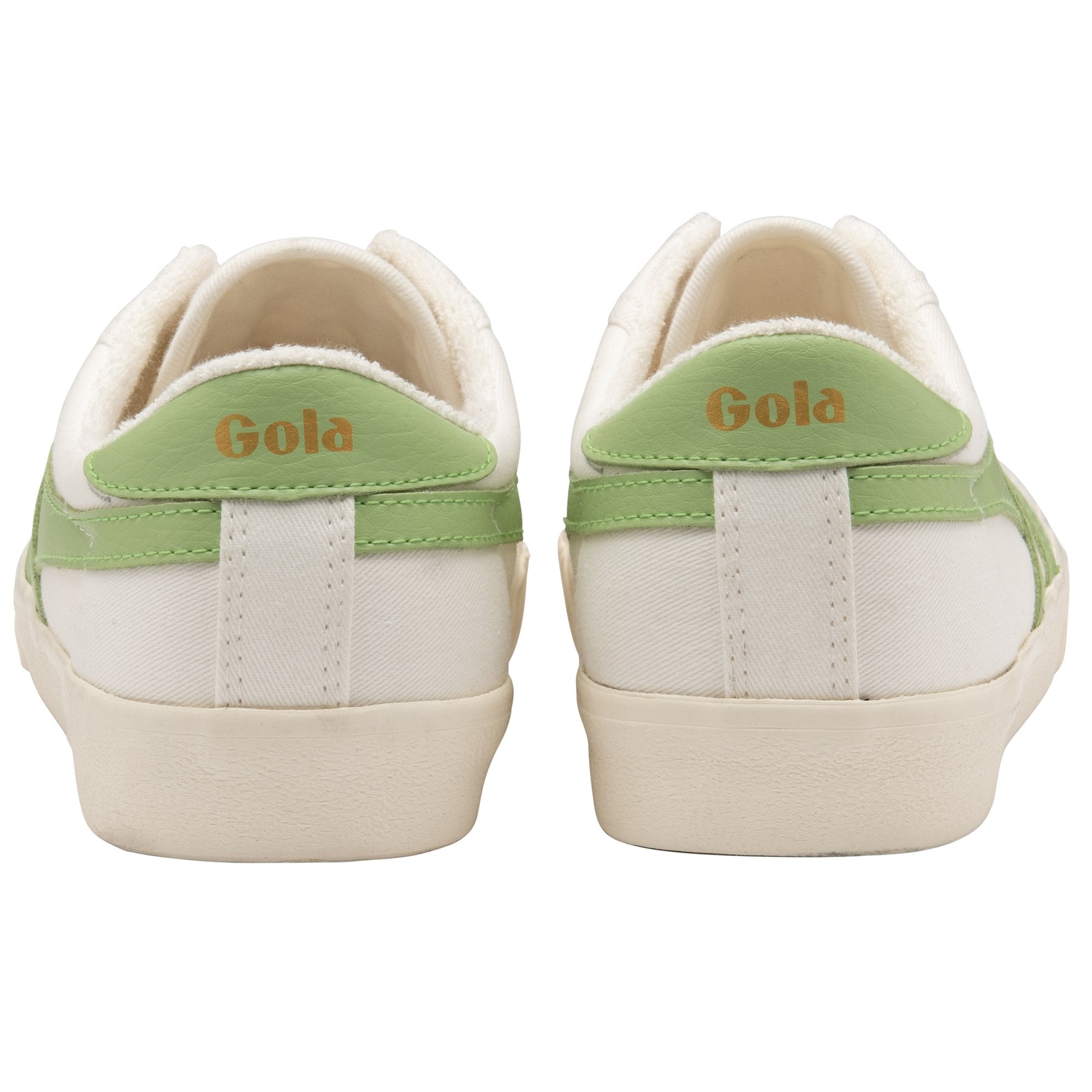 Rear view of two Gola Coaster shoes, white canvas with green trim and gold Gola logo.