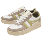 A pair of women's Gola sneakers in off-white and gold with neutral soles.
