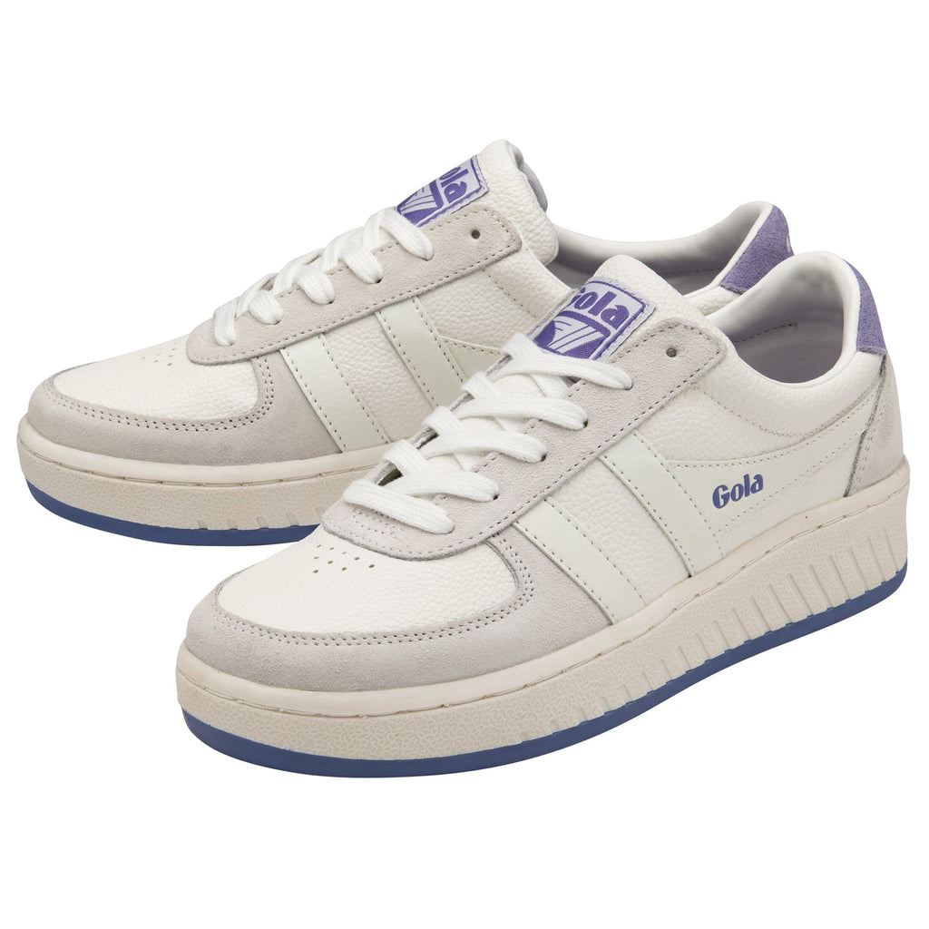 A pair of white Gola sneakers with purple accents.