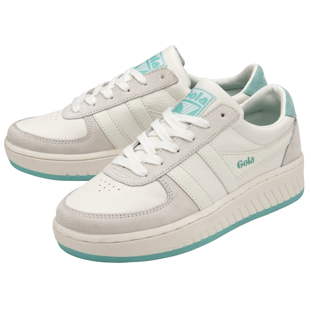 Pair of white Gola sneakers with light blue accents, angled view.
