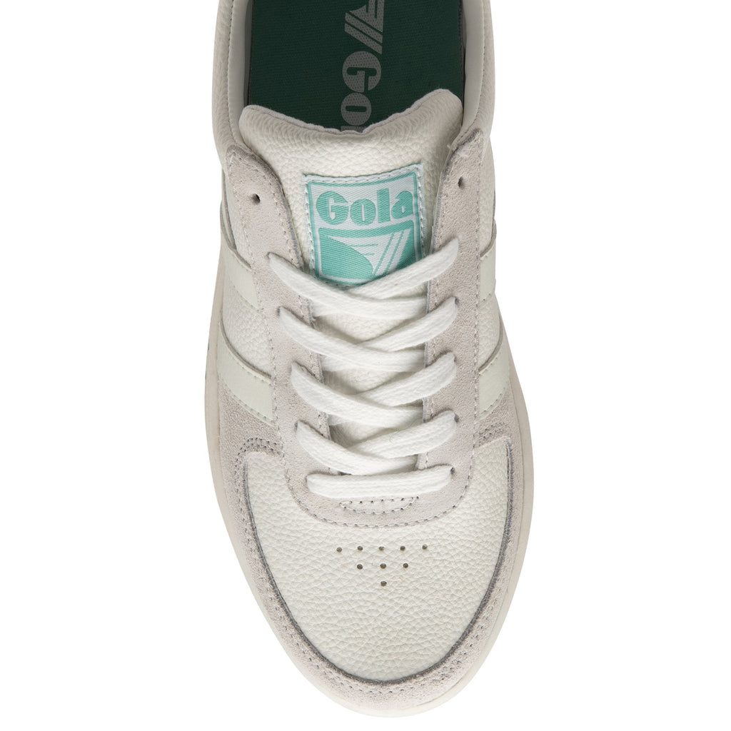 Top-down view of a single white Gola sneaker, focusing on the laces and tongue.