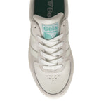 Top-down view of a single white Gola sneaker, focusing on the laces and tongue.