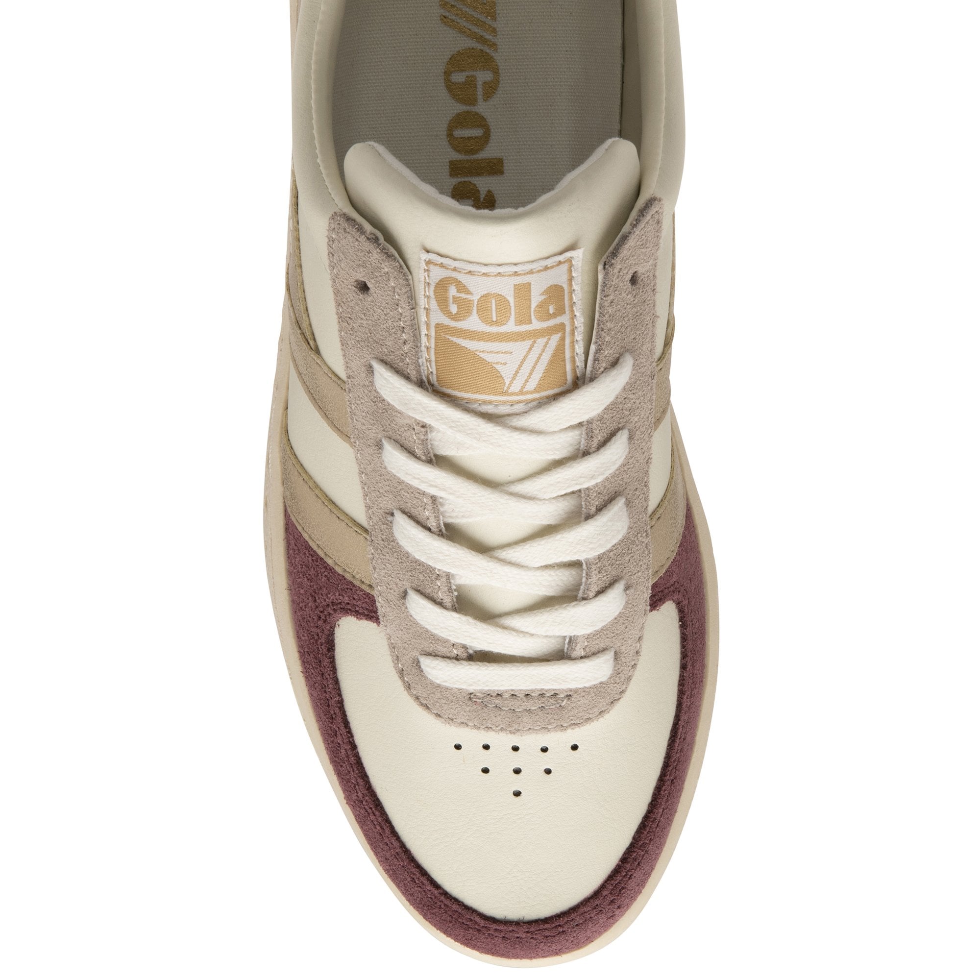 Top-down view of a women's sneaker with cream, maroon, and gold details on a white background.