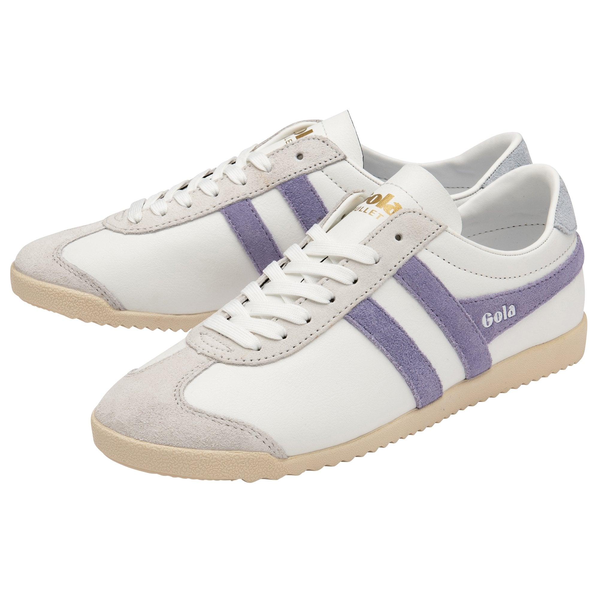 A pair of white Gola Bullet sneakers with purple stripes, angled on a white background.