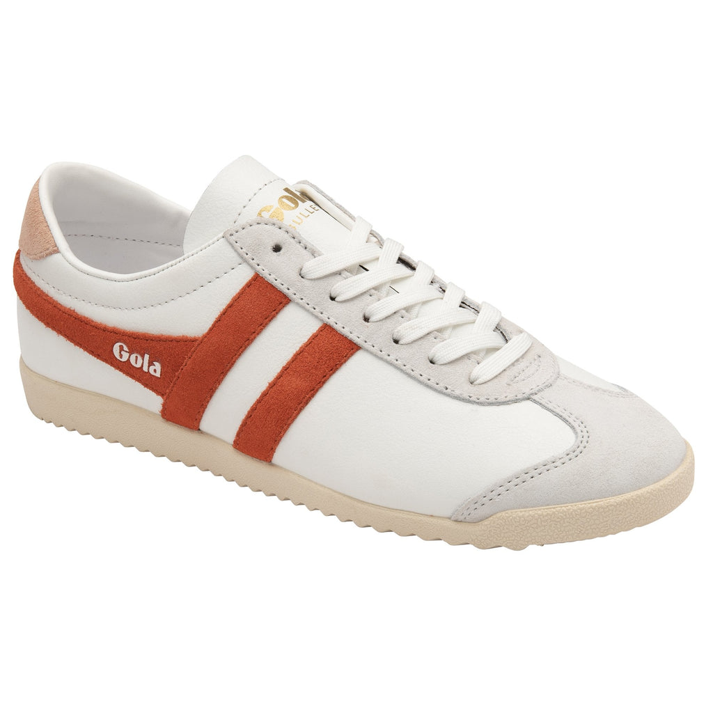 Side profile of a white Gola sneaker with orange stripes on a white background.