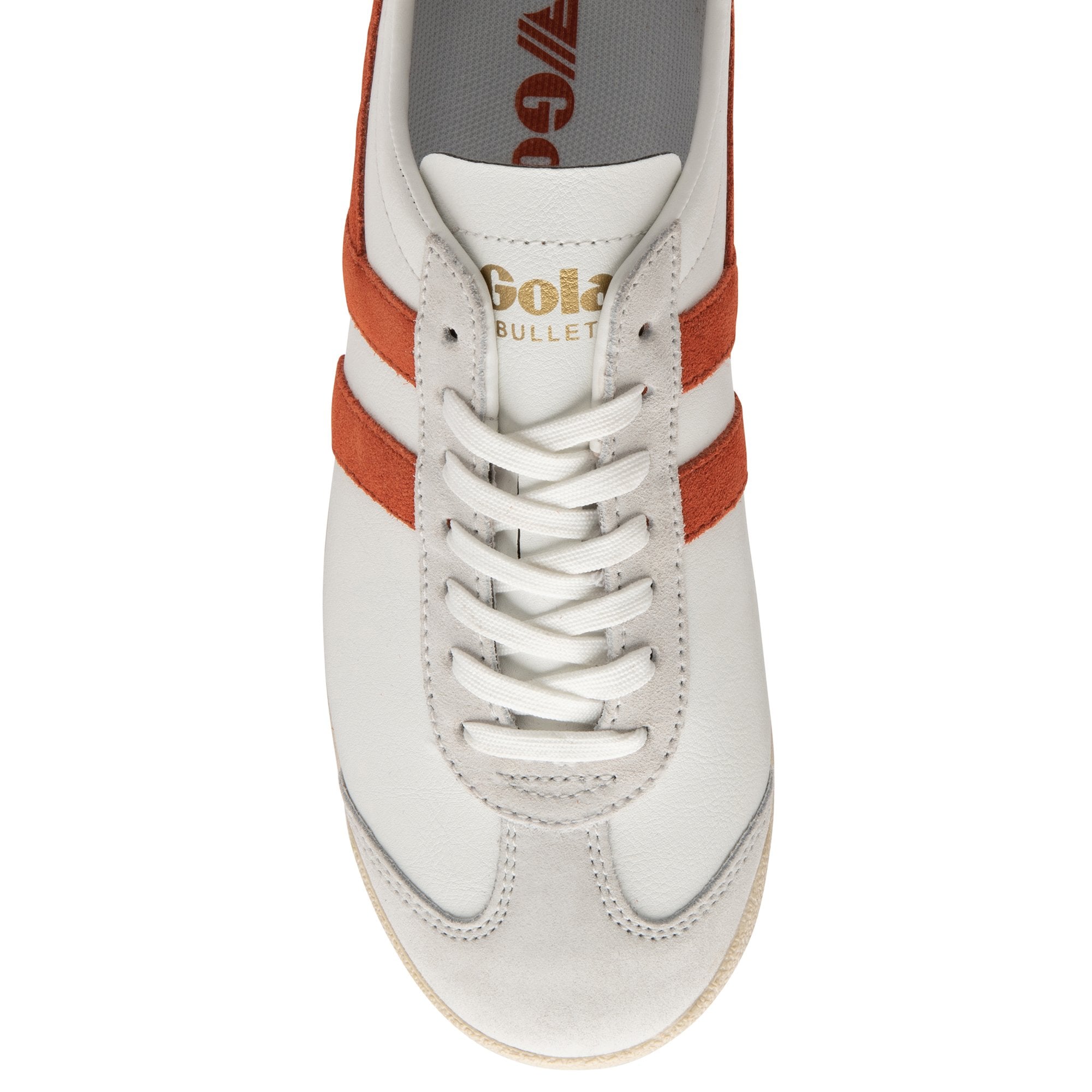 Top-down view of the front of a white Gola sneaker with orange stripes and laces.