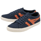 A pair of Gola low-top navy canvas sneakers with orange stripes and white soles.