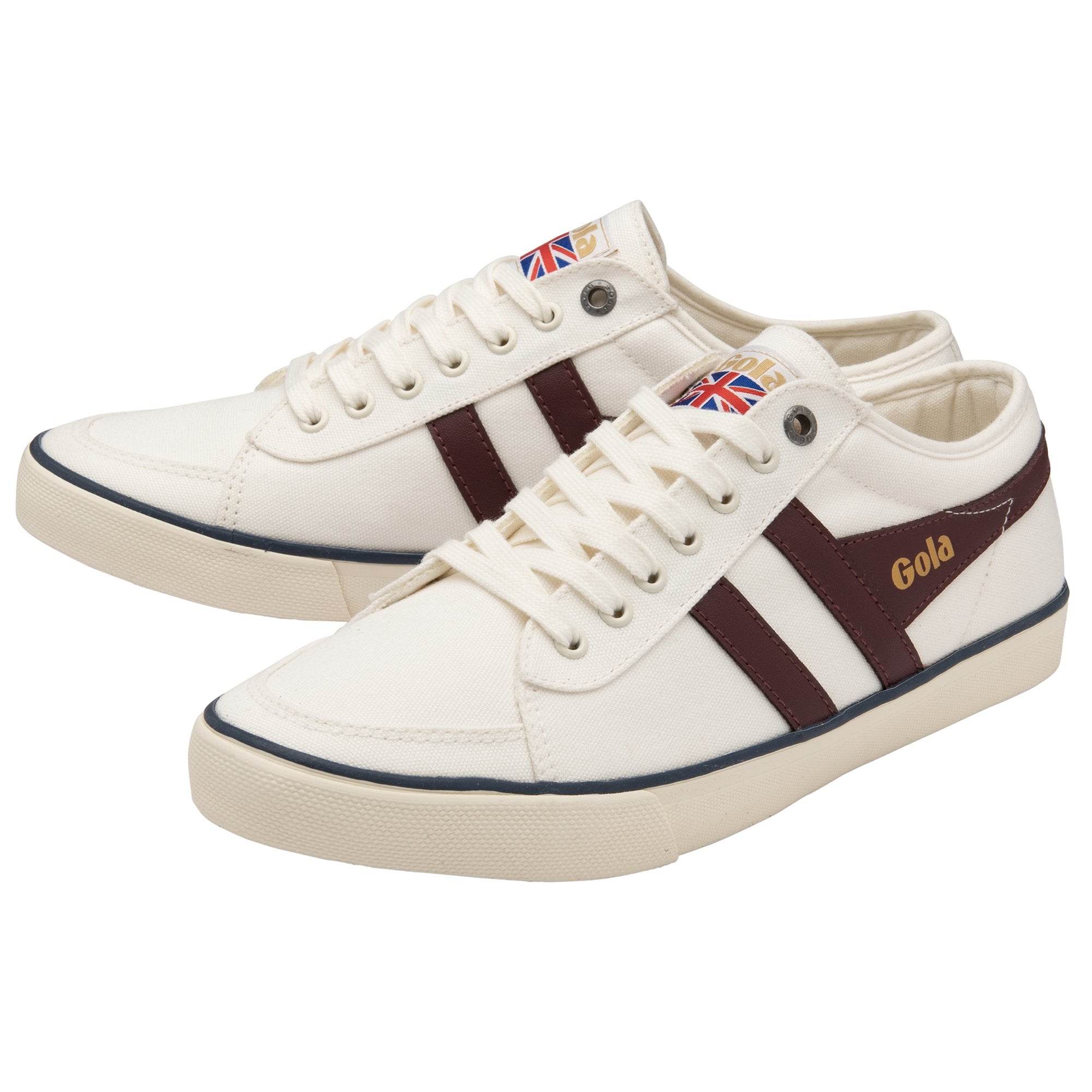 Pair of white Gola sneakers with two brown stripes and a British flag logo.