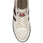 Top view of a white Gola sneaker with two brown stripes and a British flag logo.
