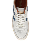 The top-down view of a single white trainer with blue stripes and white laces.