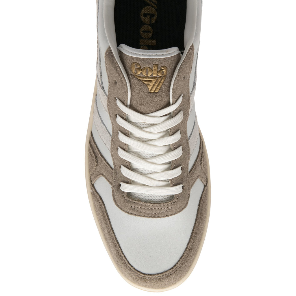 Top down view of a single Gola men's sneaker in white, taupe, green, and orange.